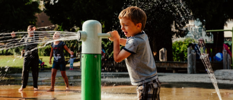 Kid playing at water park